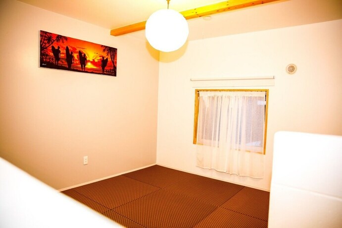 Imagen de la habitación del Hotel Shirahama Beach Garden. Foto 24