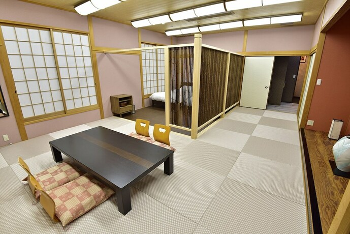 Imagen de la habitación del Hotel Shirahama Yasuragi noyado TOMARIGI. Foto 8