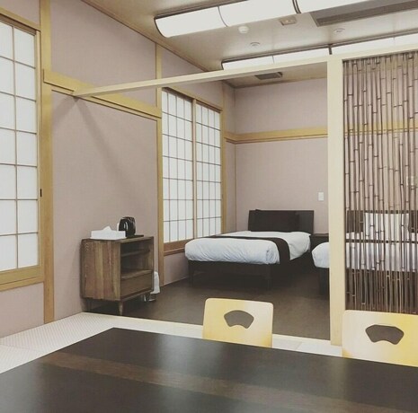 Imagen de la habitación del Hotel Shirahama Yasuragi noyado TOMARIGI. Foto 13