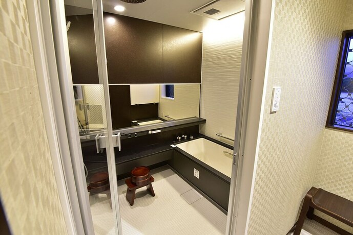 Imagen de la habitación del Hotel Shirahama Yasuragi noyado TOMARIGI. Foto 16