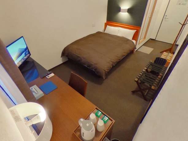 Imagen de la habitación del Hotel Shirakawa Business. Foto 6
