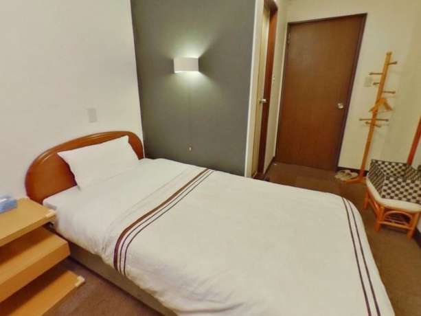 Imagen de la habitación del Hotel Shirakawa Business. Foto 9