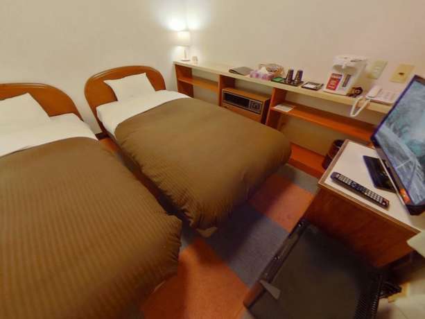 Imagen de la habitación del Hotel Shirakawa Business. Foto 11