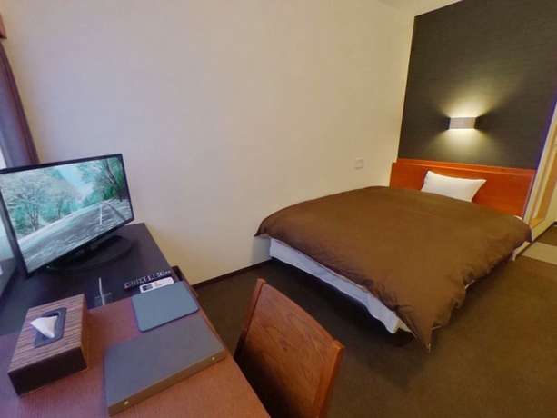 Imagen de la habitación del Hotel Shirakawa Business. Foto 12
