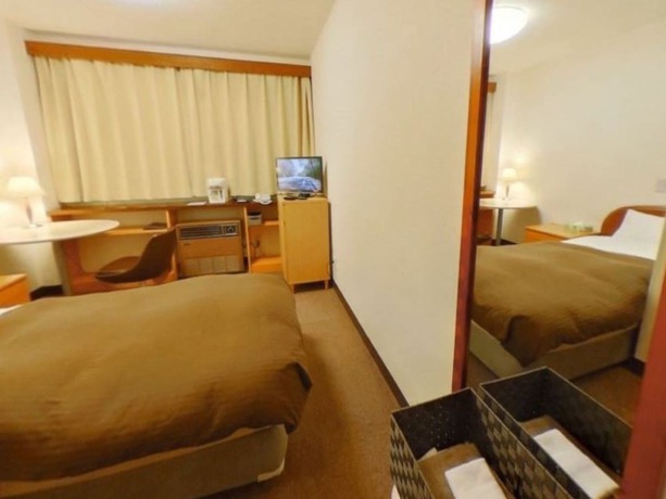 Imagen de la habitación del Hotel Shirakawa Business. Foto 13
