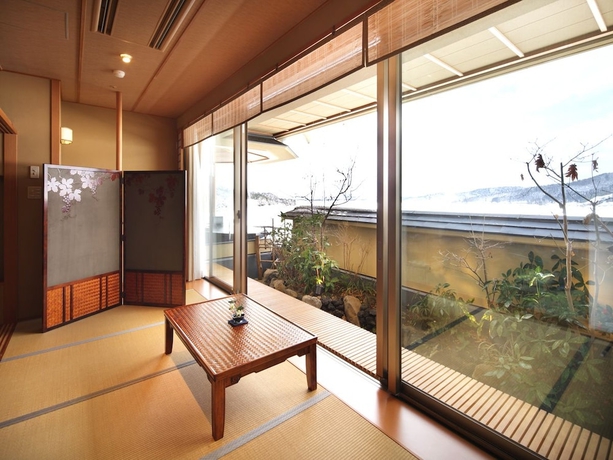 Imagen de la habitación del Hotel Shiratama No Yu Kahou Bettei Koshinosato. Foto 15
