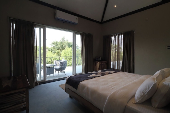Imagen de la habitación del Hotel Shiv Ganga Kanha Resort. Foto 8