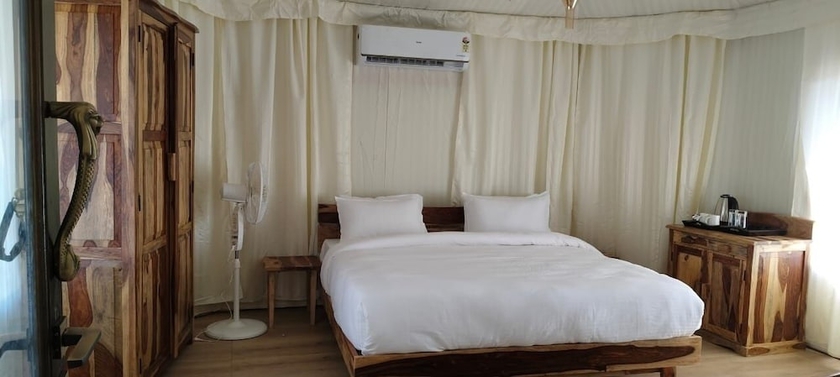 Imagen de la habitación del Hotel Shiv Ganga Kanha Resort. Foto 9