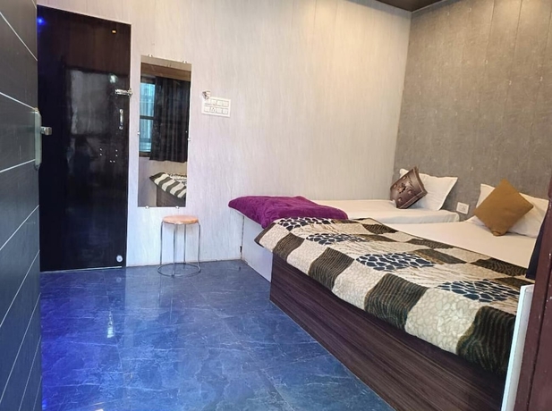 Imagen de la habitación del Hotel Shiv Kashi Paying Guest House. Foto 5