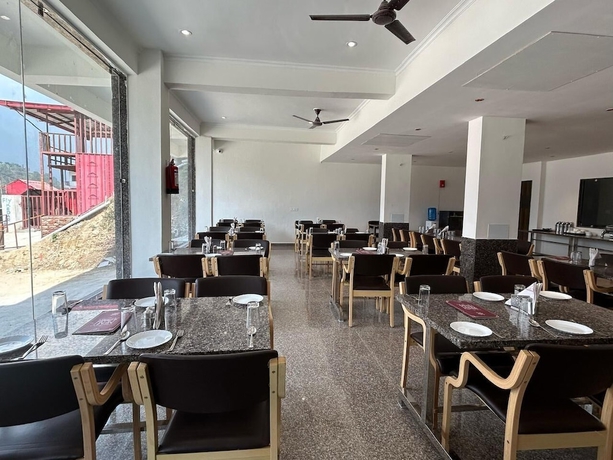 Imagen del bar/restaurante del Hotel Shiv Kedar. Foto 3