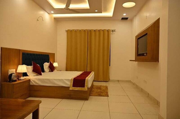 Imagen de la habitación del Hotel Shiva Palace by Golden Leafs. Foto 3