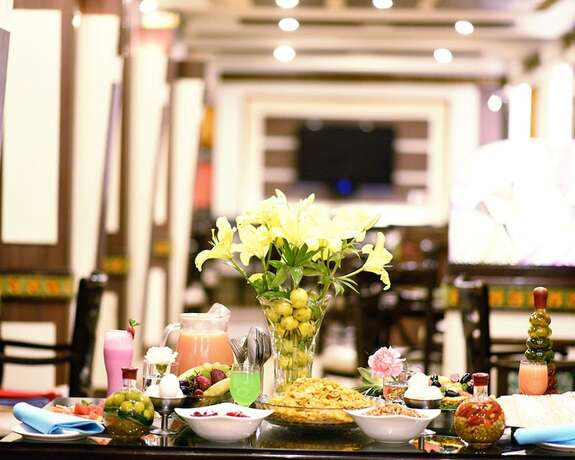 Imagen del bar/restaurante del Hotel Shiva Residency, Dehradun. Foto 15