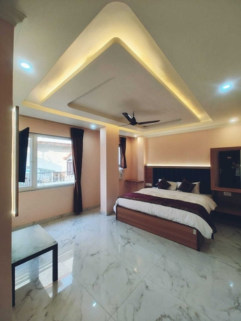 Imagen de la habitación del Hotel Shivalayam. Foto 2