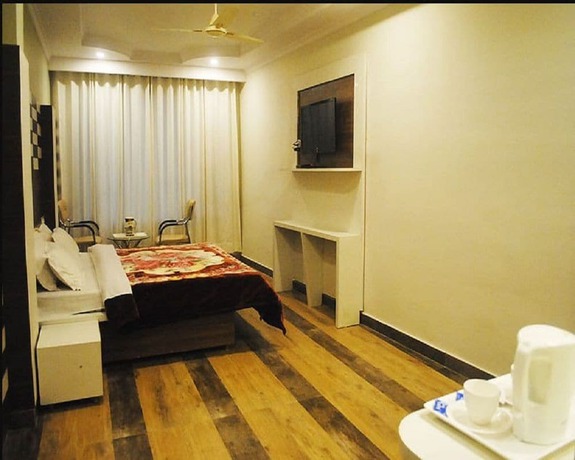 Imagen de la habitación del Hotel Shivalik Dharamshala. Foto 6
