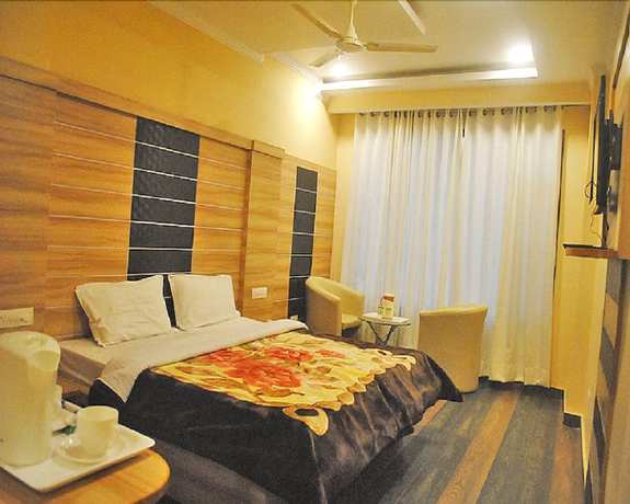 Imagen de la habitación del Hotel Shivalik Dharamshala. Foto 9