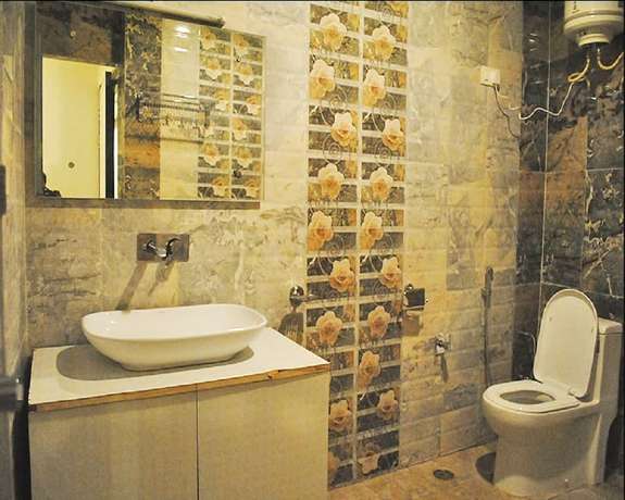 Imagen de la habitación del Hotel Shivalik Dharamshala. Foto 11