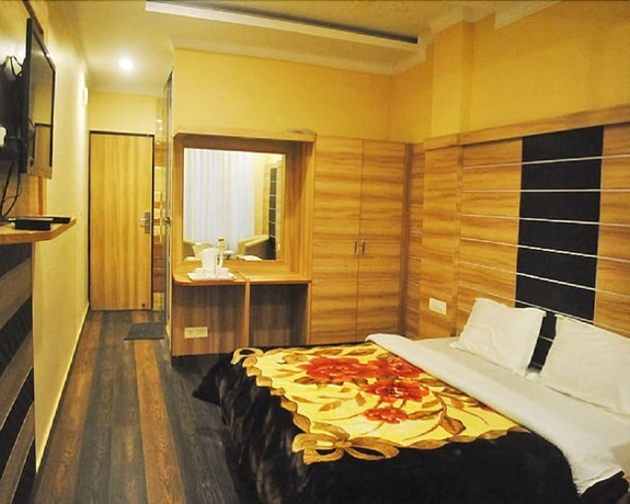 Imagen de la habitación del Hotel Shivalik Dharamshala. Foto 12