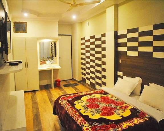Imagen de la habitación del Hotel Shivalik Dharamshala. Foto 14