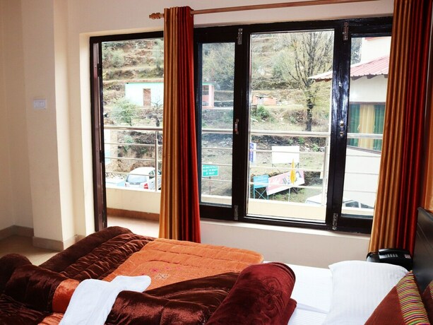 Imagen de la habitación del Hotel Shivalik River Retreat. Foto 27