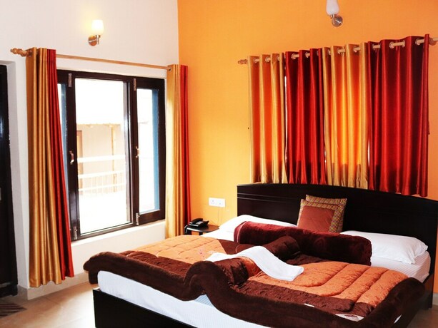 Imagen de la habitación del Hotel Shivalik River Retreat. Foto 30