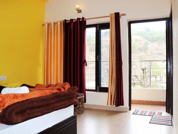 Imagen de la habitación del Hotel Shivalik River Retreat. Foto 34