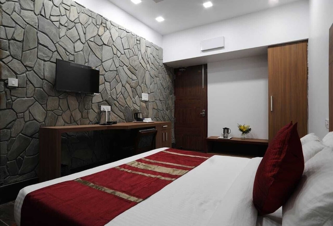 Imagen de la habitación del Hotel Shivani Foods And Resort. Foto 6