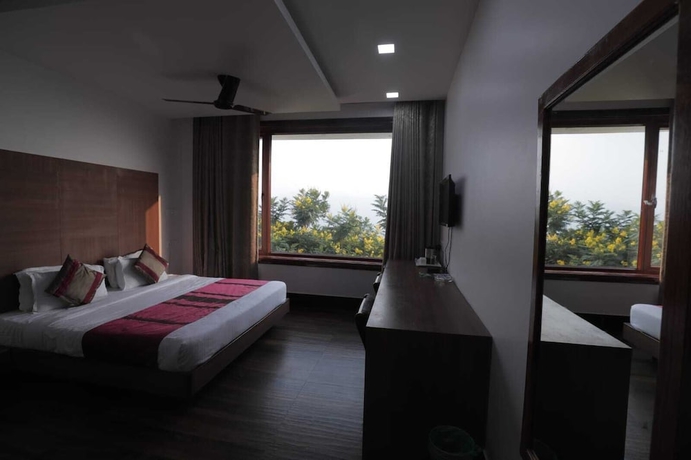 Imagen de la habitación del Hotel Shivani Foods And Resort. Foto 7