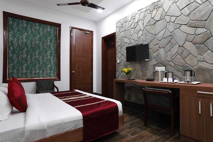 Imagen de la habitación del Hotel Shivani Foods And Resort. Foto 10