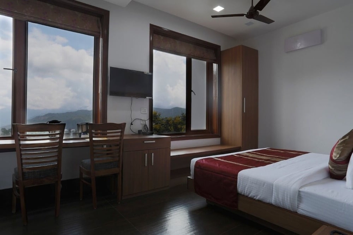 Imagen de la habitación del Hotel Shivani Foods And Resort. Foto 14