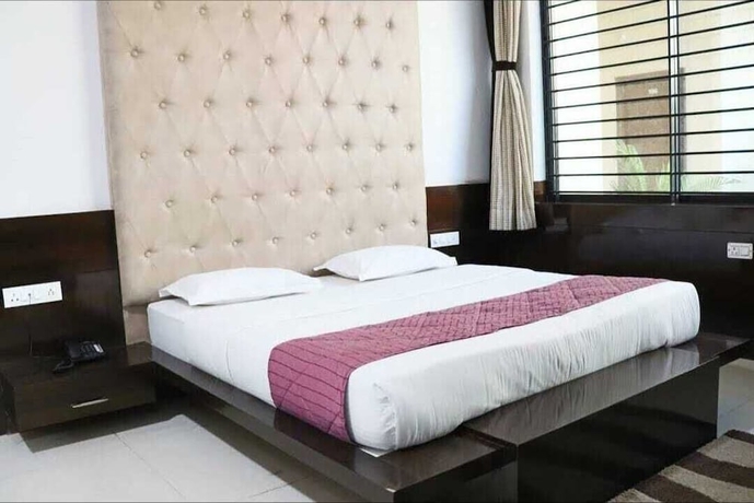 Imagen de la habitación del Hotel Shivani Resort. Foto 6