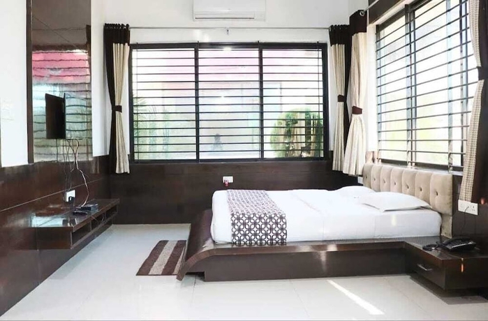 Imagen de la habitación del Hotel Shivani Resort. Foto 8