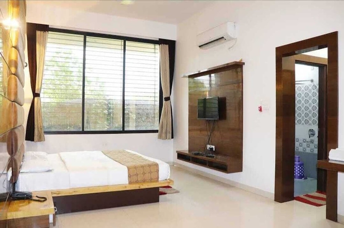 Imagen de la habitación del Hotel Shivani Resort. Foto 9