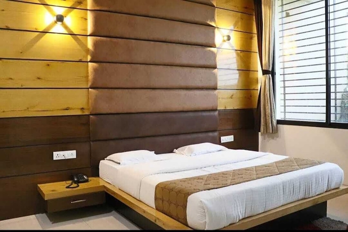 Imagen de la habitación del Hotel Shivani Resort. Foto 10