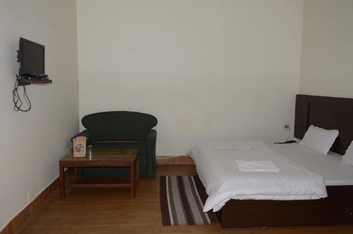 Imagen de la habitación del Hotel Shivlinga Tourist Complex. Foto 5