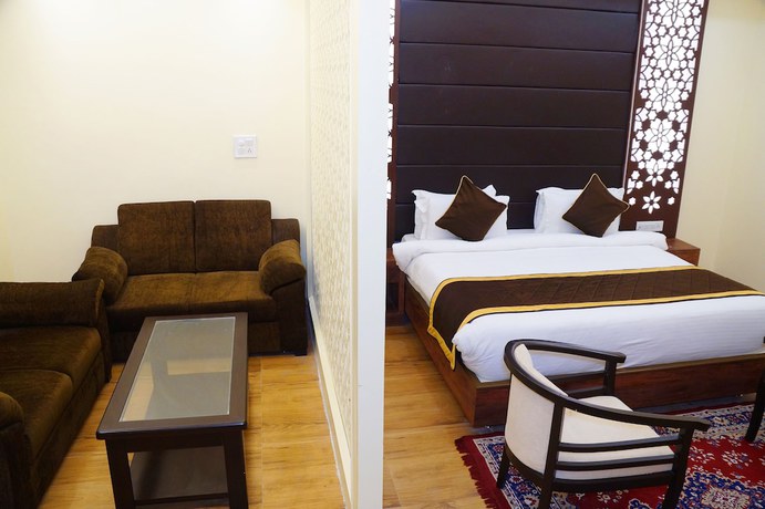 Imagen de la habitación del Hotel Shivoy Grand. Foto 16