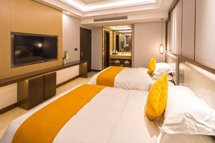 Imagen de la habitación del Hotel Shizhou International. Foto 11