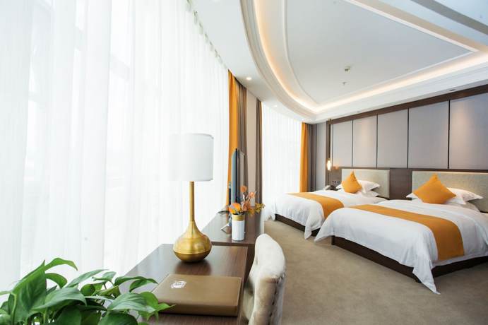 Imagen de la habitación del Hotel Shizhou International. Foto 17