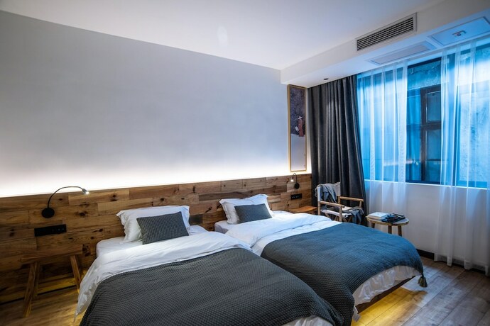 Imagen de la habitación del Hotel Shizi Guesthouse. Foto 2