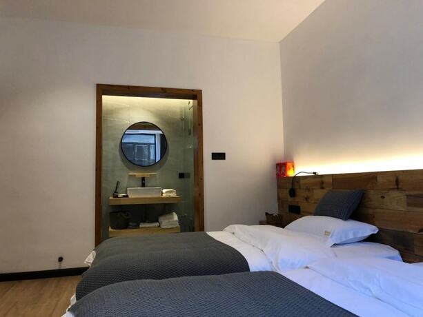 Imagen de la habitación del Hotel Shizi Guesthouse. Foto 3