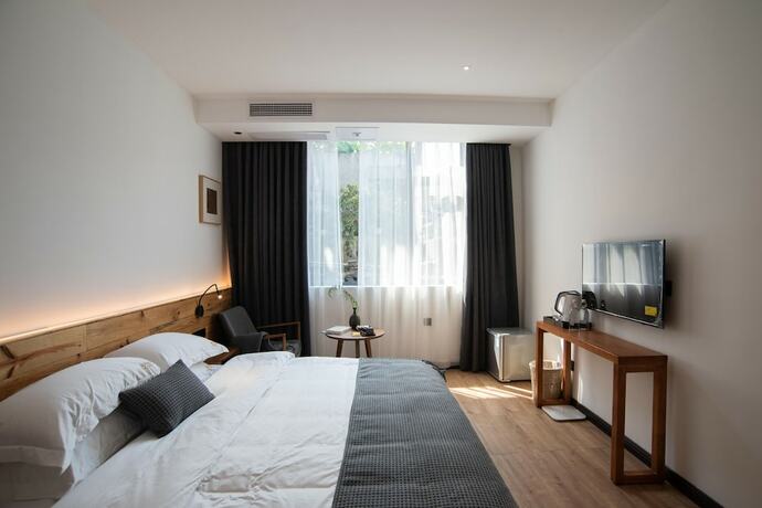 Imagen de la habitación del Hotel Shizi Guesthouse. Foto 4