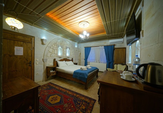 Imagen de la habitación del Hotel ShoeString Stone House. Foto 5