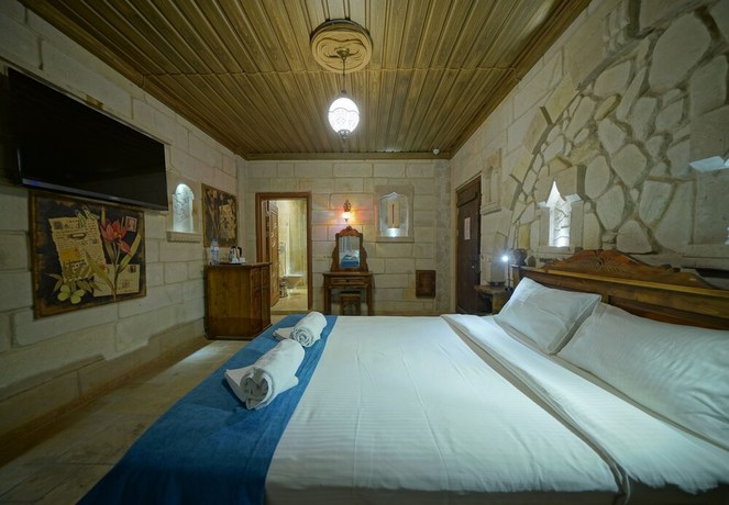 Imagen de la habitación del Hotel ShoeString Stone House. Foto 15