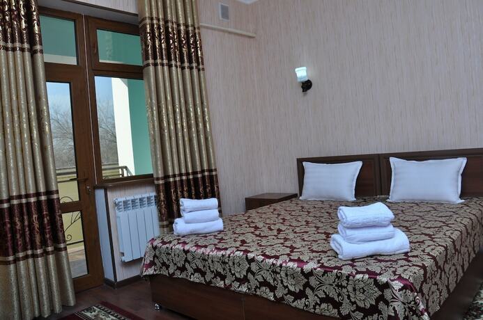 Imagen de la habitación del Hotel Shokhjakhon. Foto 9