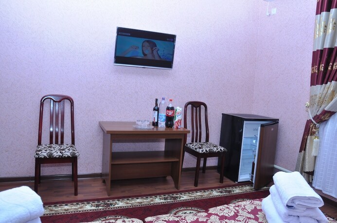 Imagen de la habitación del Hotel Shokhjakhon. Foto 10