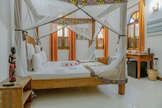 Imagen de la habitación del Hotel Shoki Shoki House Stone Town. Foto 12