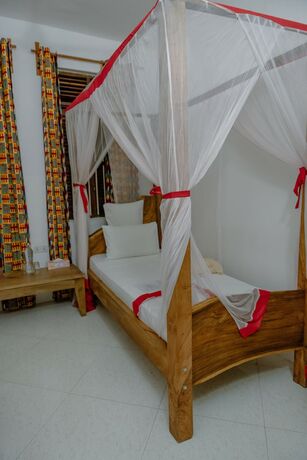 Imagen de la habitación del Hotel Shoki Shoki House Stone Town. Foto 18