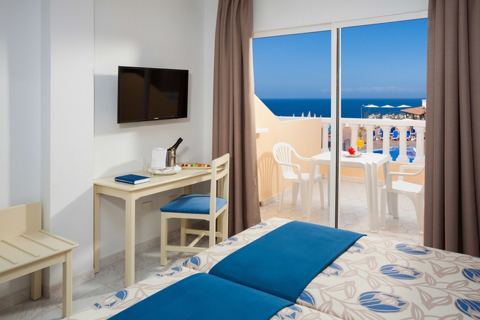 Imagen de la habitación del Hotel Sholeo Lodges Los Gigantes. Foto 11