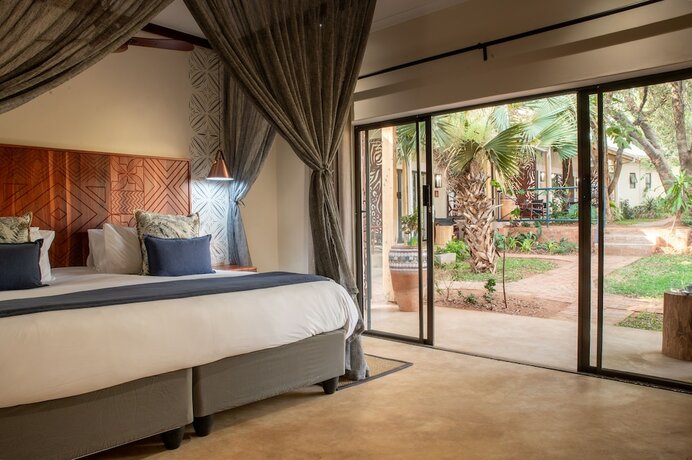 Imagen de la habitación del Hotel Shongwe Oasis. Foto 16