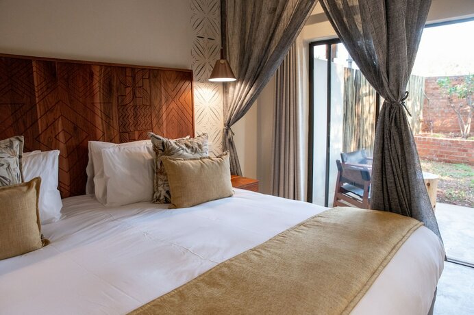 Imagen de la habitación del Hotel Shongwe Oasis. Foto 18