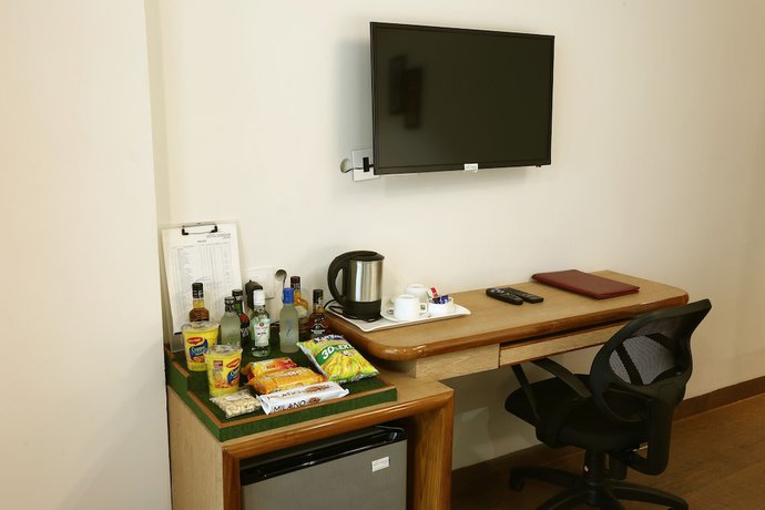 Imagen de la habitación del Hotel Shoolin Grand. Foto 7